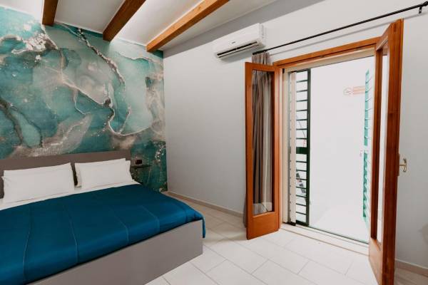 Habitación doble deluxe con cama supletoria