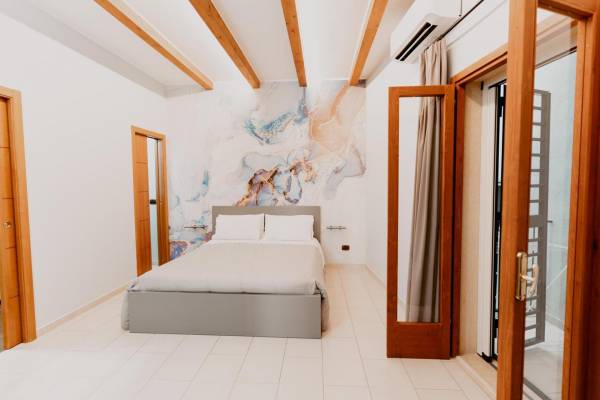 Camera matrimoniale deluxe con letto supplementare